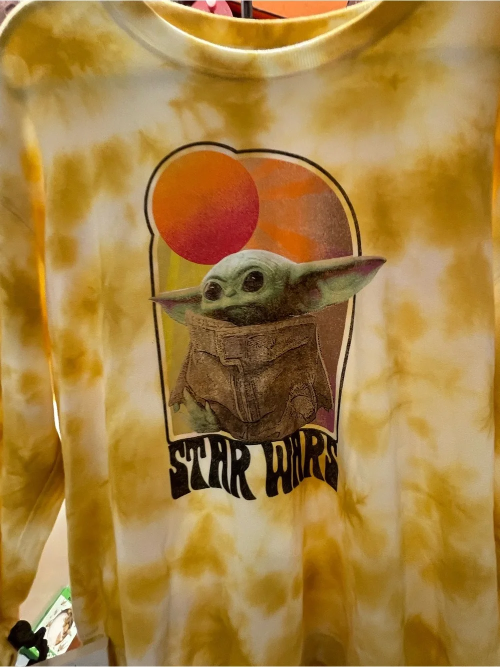 yellow and white tie-dye Star Wars crewneck sweatshirt featuring a retro graphic